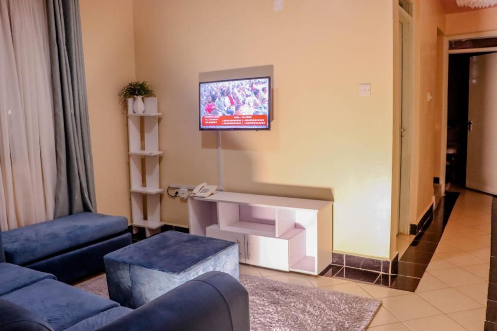 Posezení v ubytování Dayo Suites and Hotel