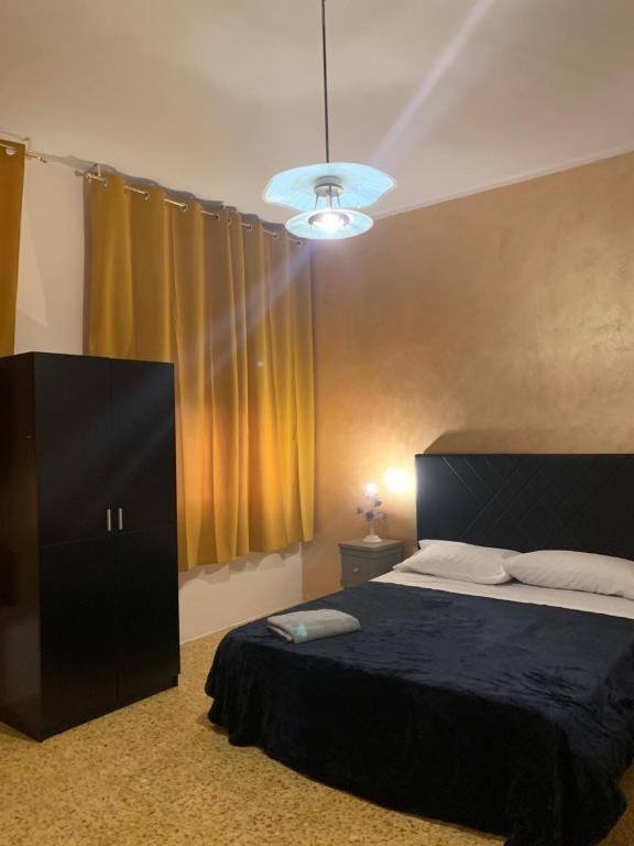 Postel nebo postele na pokoji v ubytování PRINCIPE ROOMS