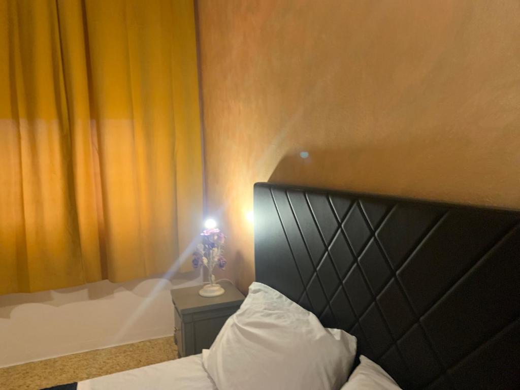 Postel nebo postele na pokoji v ubytování PRINCIPE ROOMS