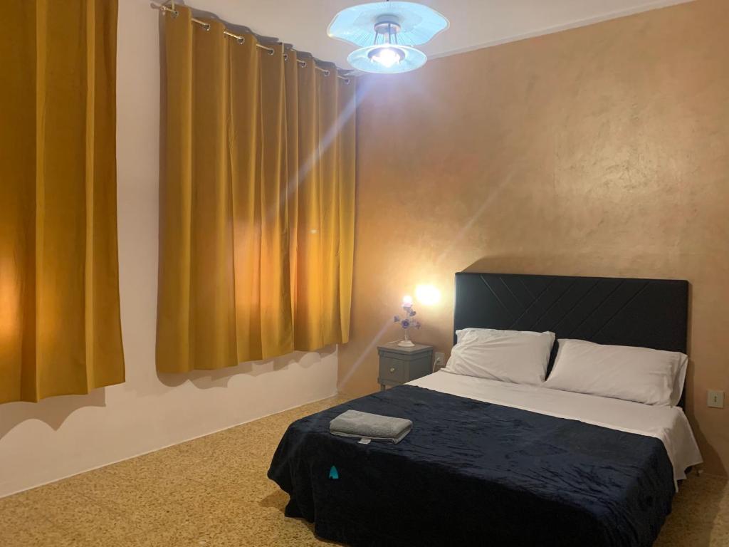 Postel nebo postele na pokoji v ubytování PRINCIPE ROOMS