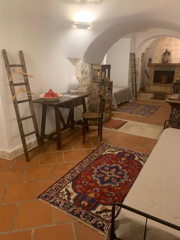 Postel nebo postele na pokoji v ubytování Trulli Santa Maria Odegitria Relais