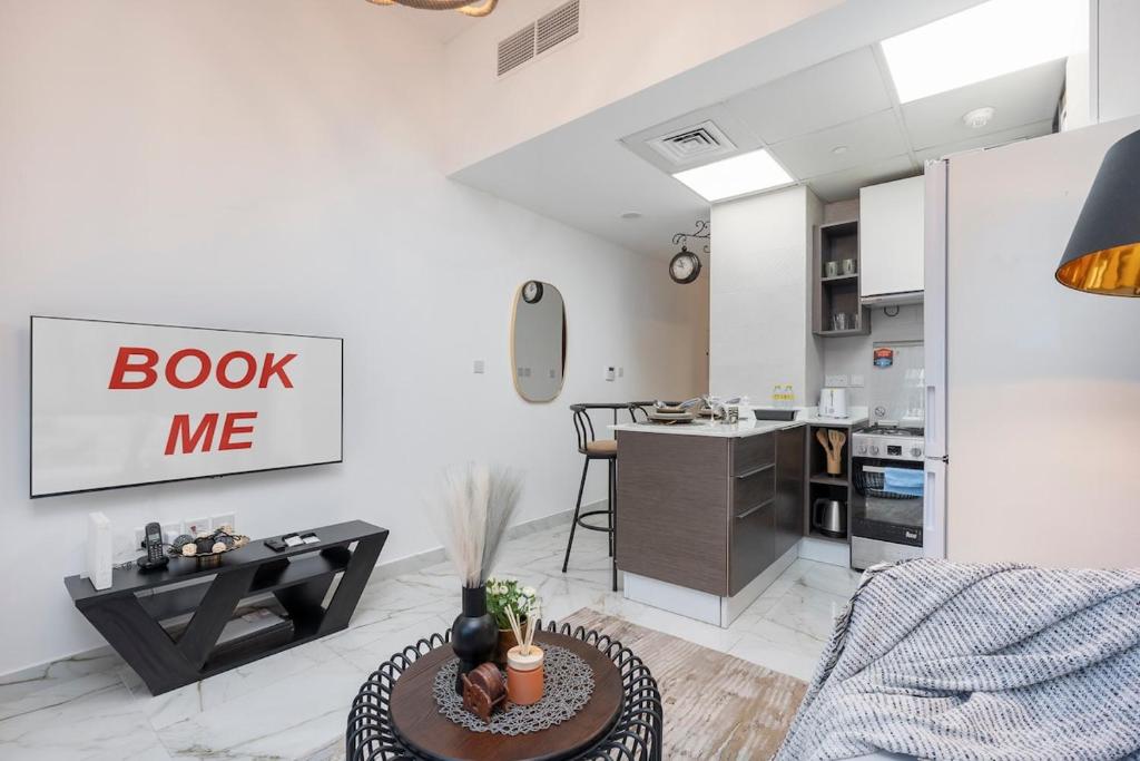 Homey Studio Homey studio apartment with warm and inviting ambiance in JVC!, Dubái ...