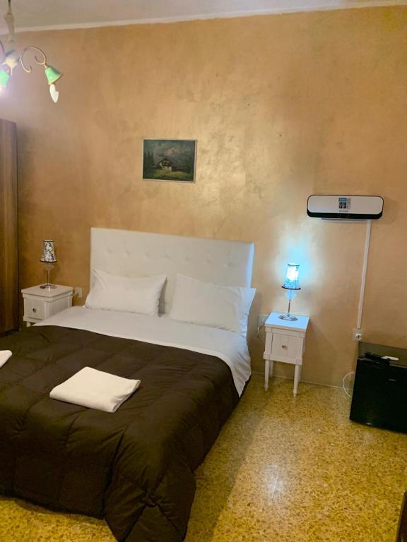 Postel nebo postele na pokoji v ubytování PRINCIPE ROOMS