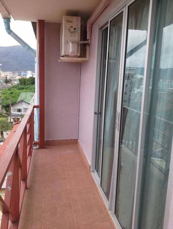 Balkón nebo terasa v ubytování Bonanza Patong Hotel
