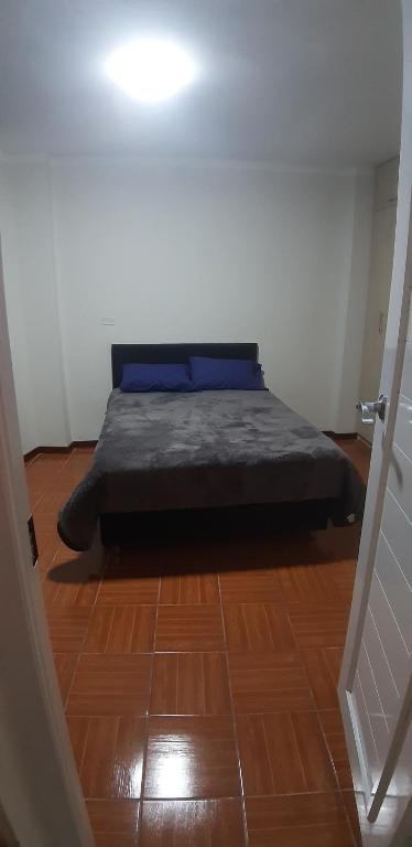 Postel nebo postele na pokoji v ubytování Urpi Wasi Backpackers