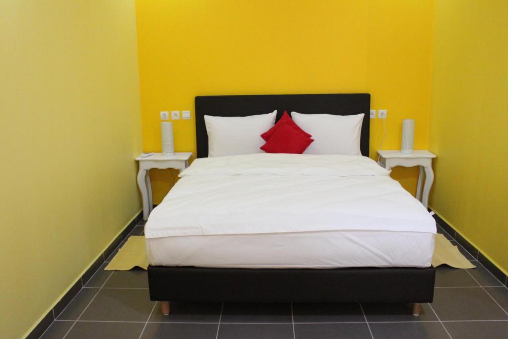 Postel nebo postele na pokoji v ubytování Auberge Tinit