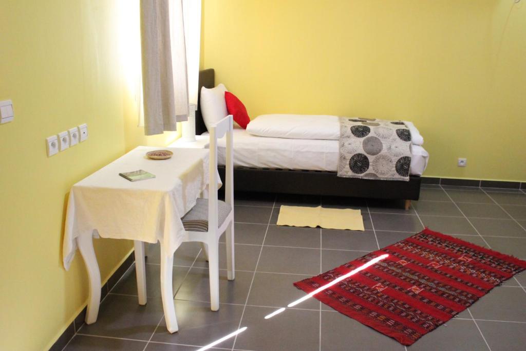 Postel nebo postele na pokoji v ubytování Auberge Tinit