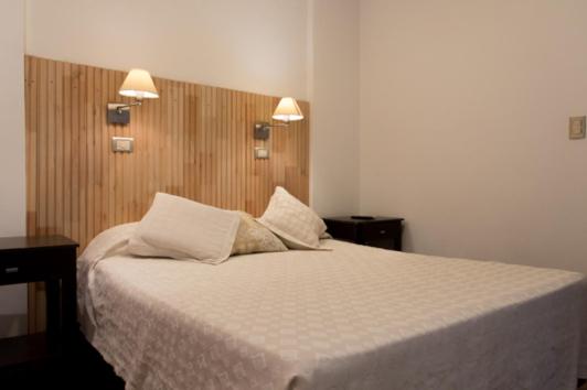 Postel nebo postele na pokoji v ubytování Hotel Residencial España