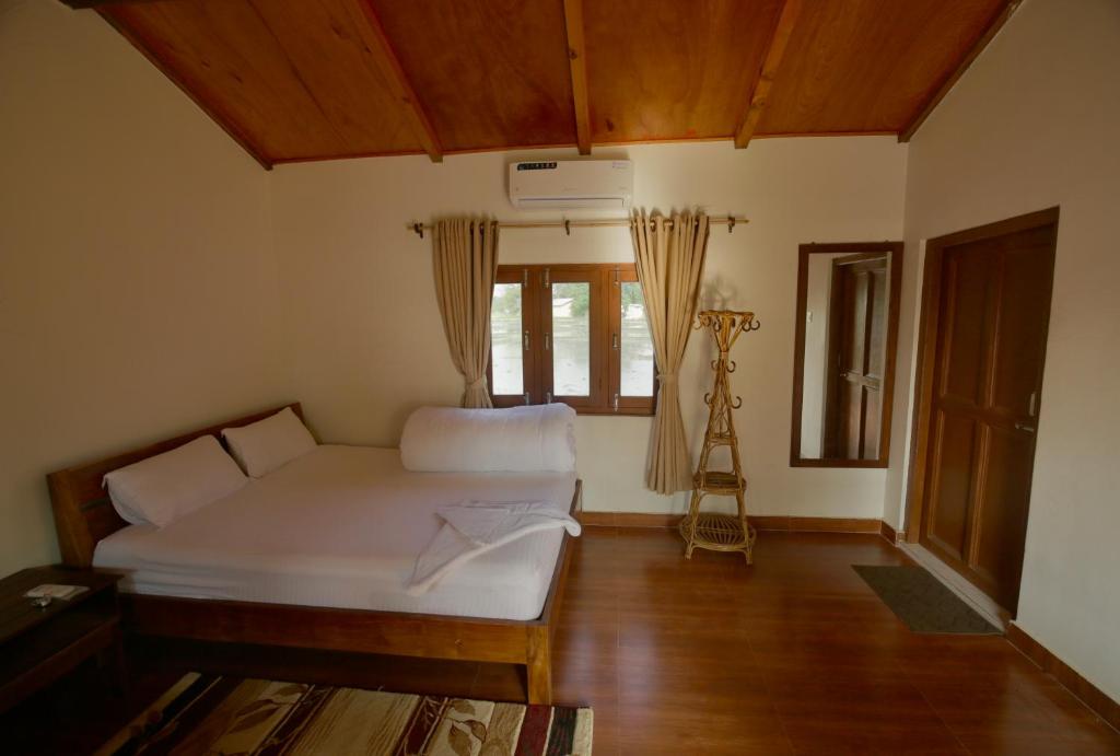 Postel nebo postele na pokoji v ubytování Bardia Eco Friendly Homestay