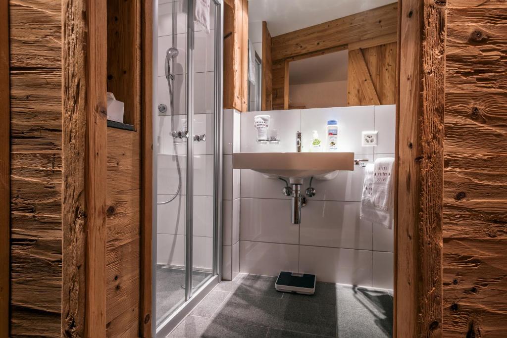 Koupelna v ubytování Arosa Vetter Hotel