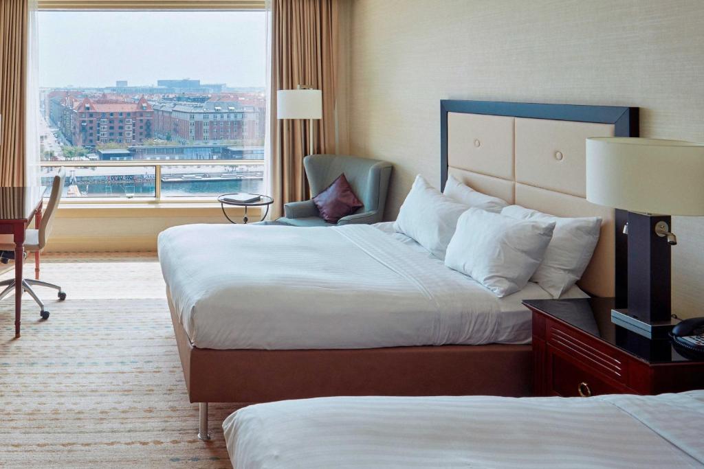 Postel nebo postele na pokoji v ubytování Copenhagen Marriott Hotel