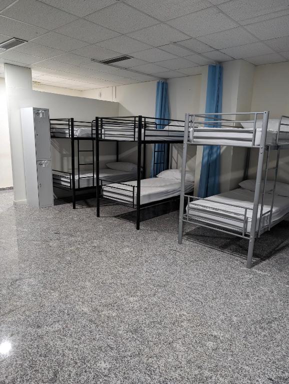 Postel nebo postele na pokoji v ubytování Hoomy Hostel