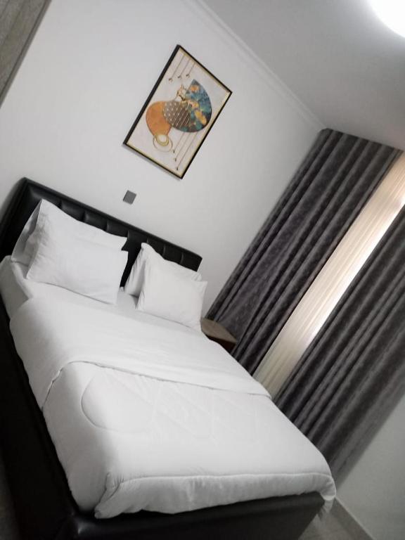 Llit o llits en una habitació de CosyNook 2Bedrooms