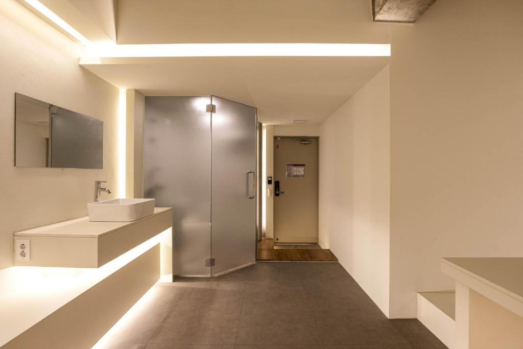 TV a/nebo společenská místnost v ubytování ADO hotel