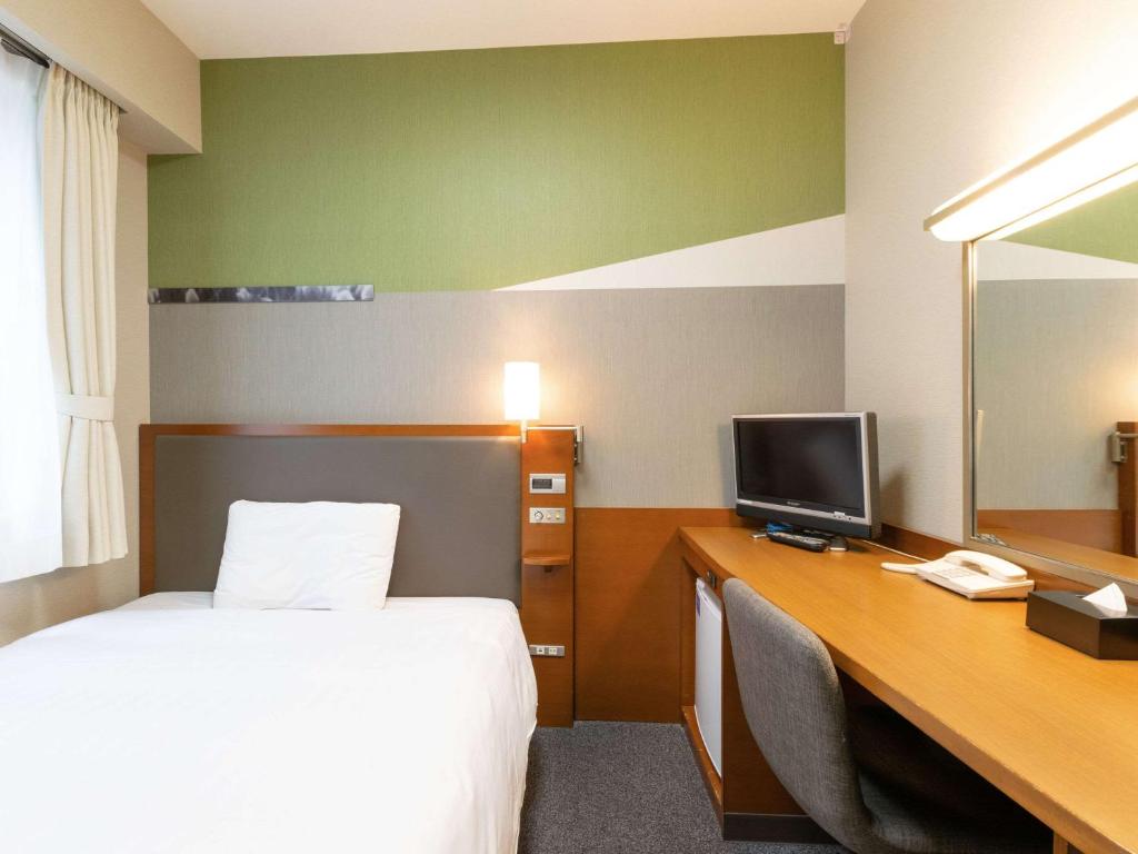 TV a/nebo společenská místnost v ubytování Comfort Hotel Toyama