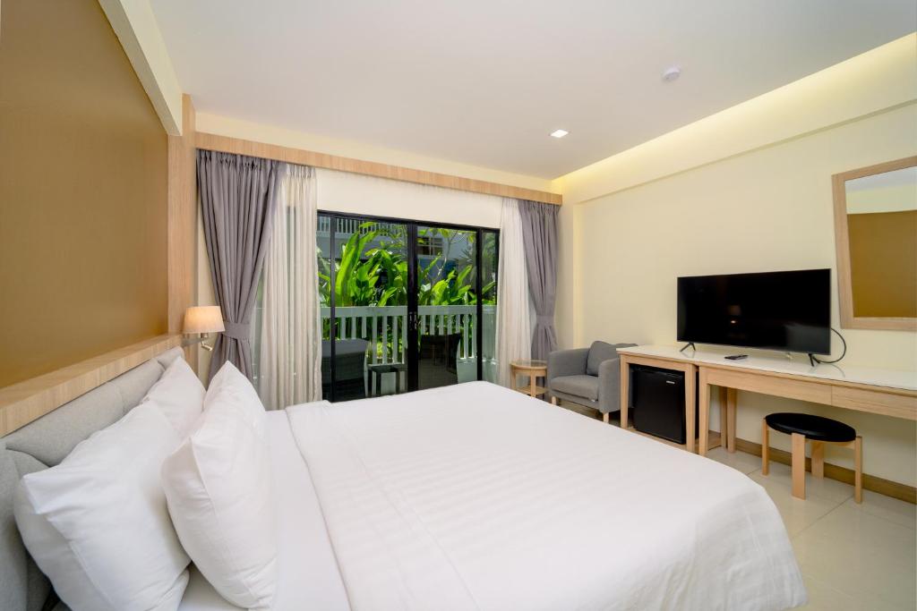 TV a/nebo společenská místnost v ubytování Aonang Buri Resort