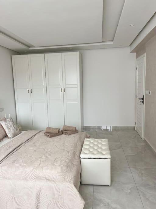 Ένα ή περισσότερα κρεβάτια σε δωμάτιο στο Appartement Duplex Tanger