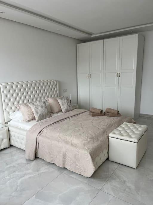 Ένα ή περισσότερα κρεβάτια σε δωμάτιο στο Appartement Duplex Tanger