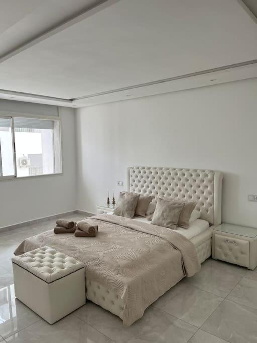 Ένα ή περισσότερα κρεβάτια σε δωμάτιο στο Appartement Duplex Tanger