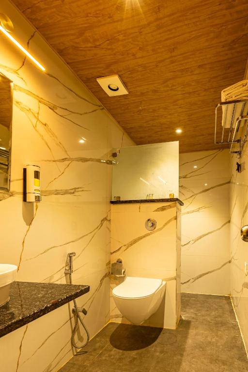 Koupelna v ubytování Hotel Vedangam