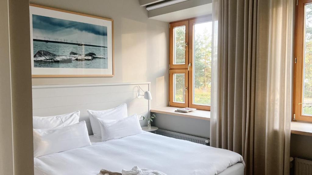 Llit o llits en una habitació de LaSpa Beach House