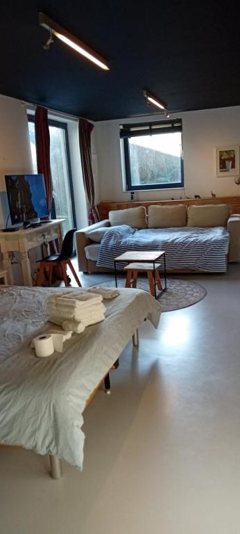 Postel nebo postele na pokoji v ubytování Chez Olivier