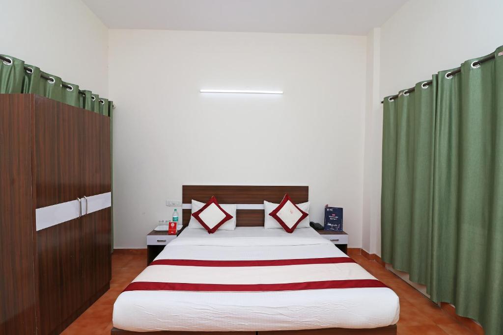 Postel nebo postele na pokoji v ubytování Hotel O Prime Plaza
