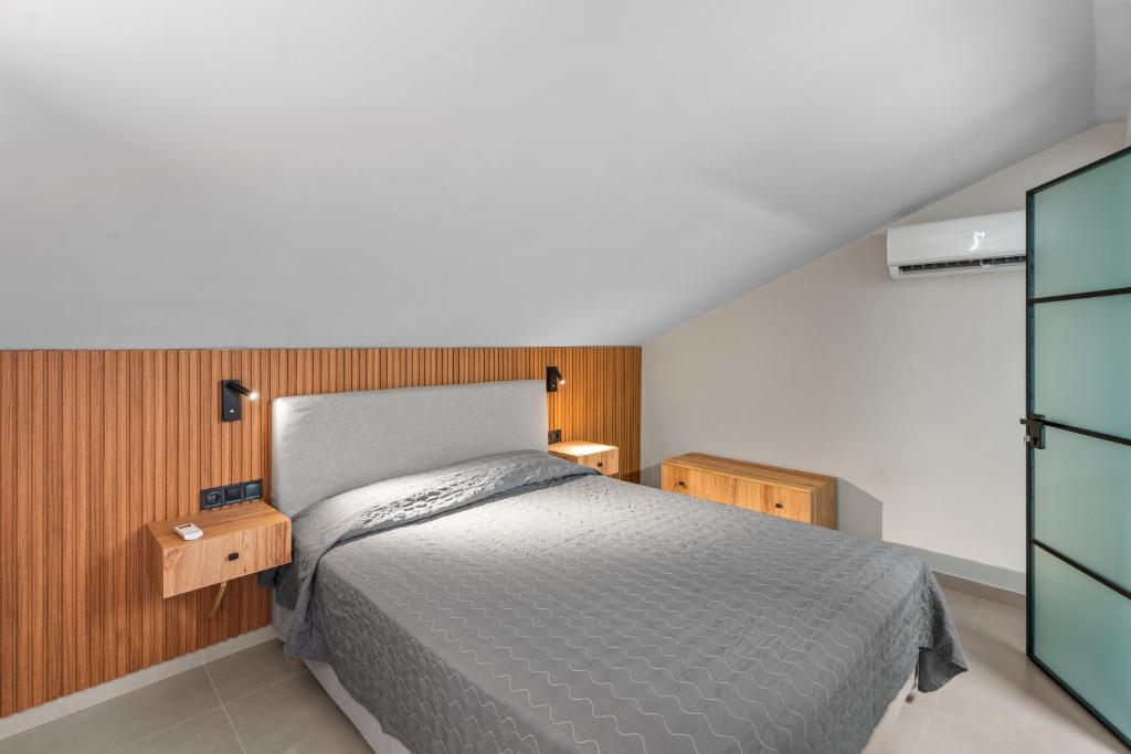 Letto o letti in una camera di Aqualand Resort