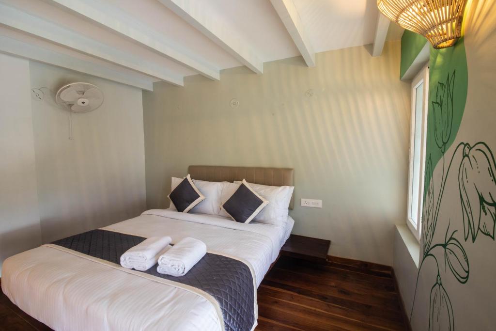 Postel nebo postele na pokoji v ubytování La Papillon Maison