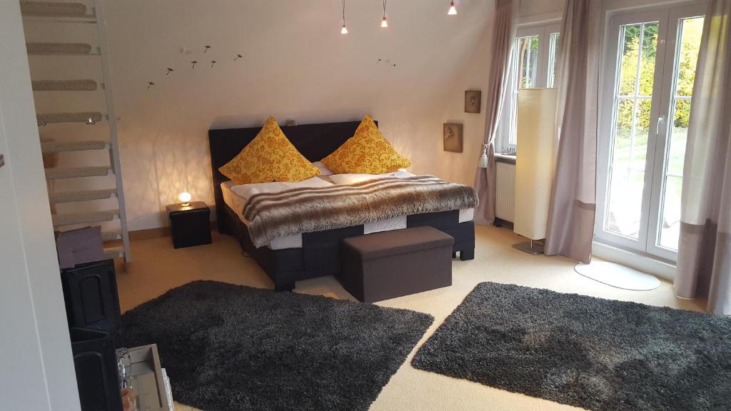 Postel nebo postele na pokoji v ubytování Gästezimmer Im Haus Am Wald