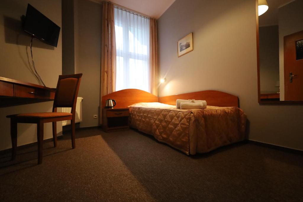 Posteľ alebo postele v izbe v ubytovaní Nasz Klub - Pokoje Gościnne