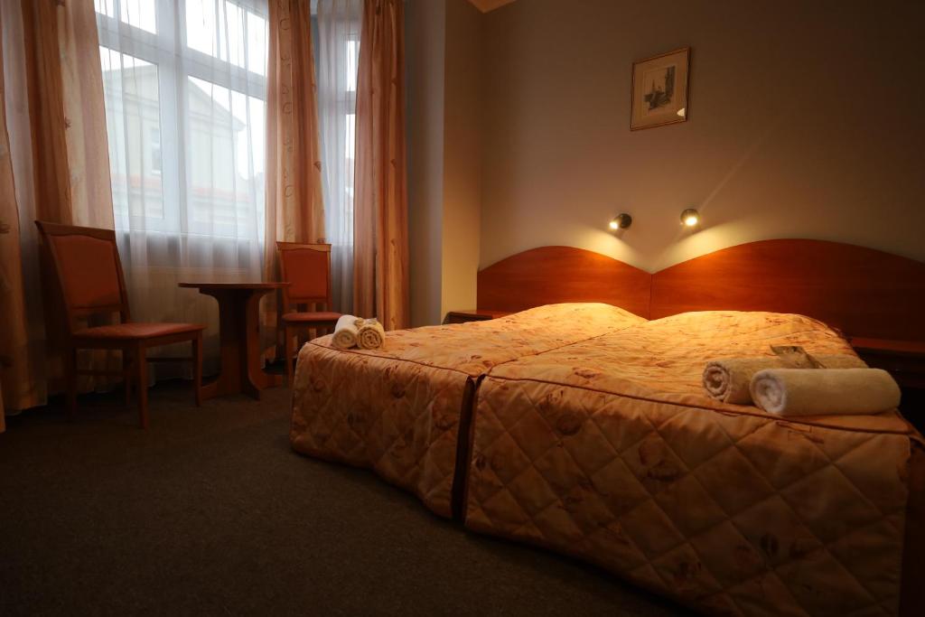 Posteľ alebo postele v izbe v ubytovaní Nasz Klub - Pokoje Gościnne