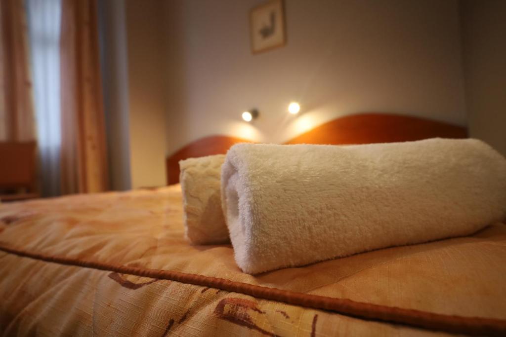 Posteľ alebo postele v izbe v ubytovaní Nasz Klub - Pokoje Gościnne
