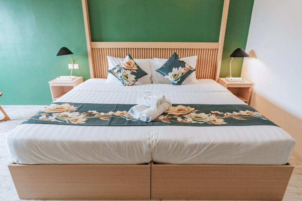 Voodi või voodid majutusasutuse Diane Residences toas