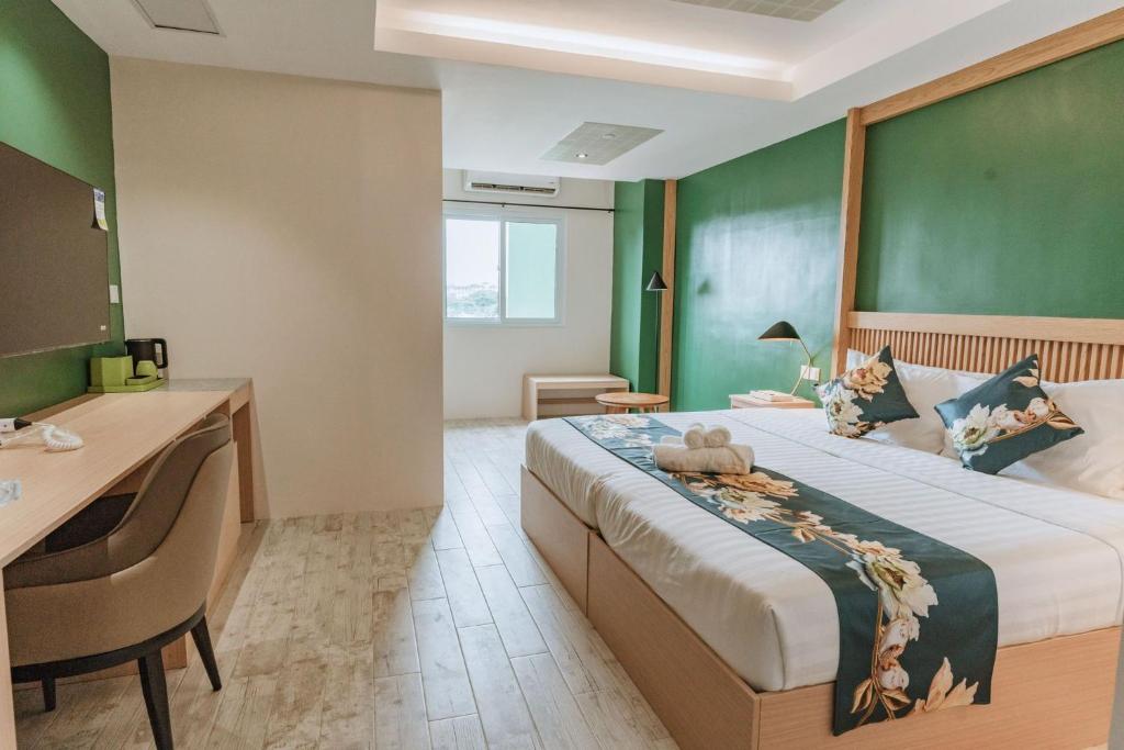 Voodi või voodid majutusasutuse Diane Residences toas