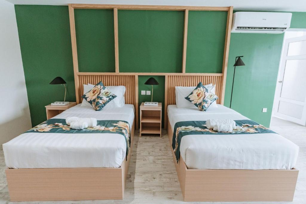 Voodi või voodid majutusasutuse Diane Residences toas