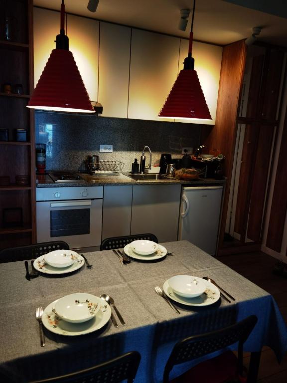 Kuchyň nebo kuchyňský kout v ubytování Apartman DETLIĆ Divčigora