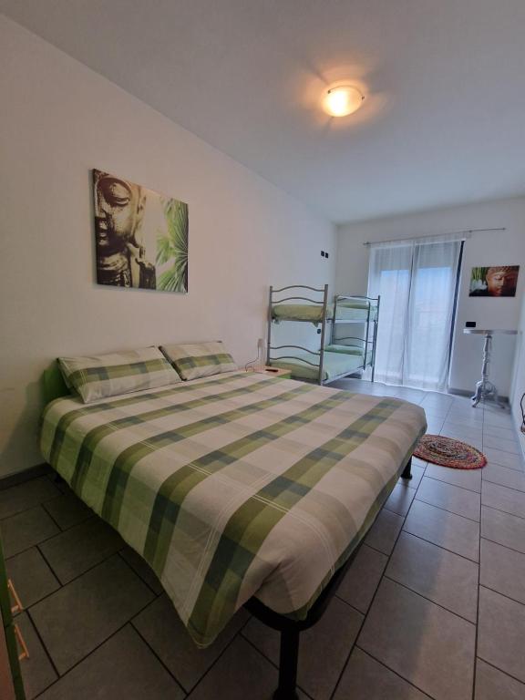 Postel nebo postele na pokoji v ubytování B&B Zia Vivina