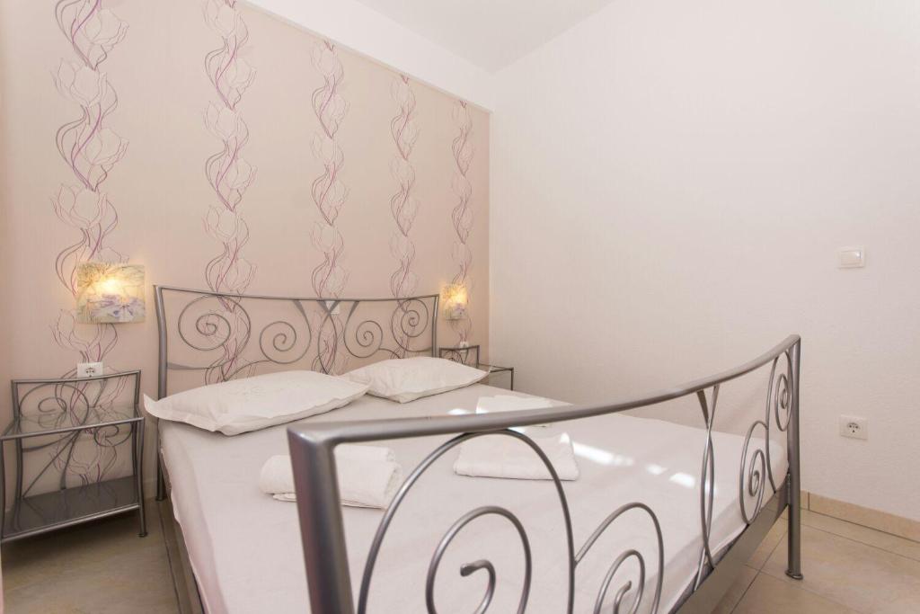 Postel nebo postele na pokoji v ubytování Apartment Bareta