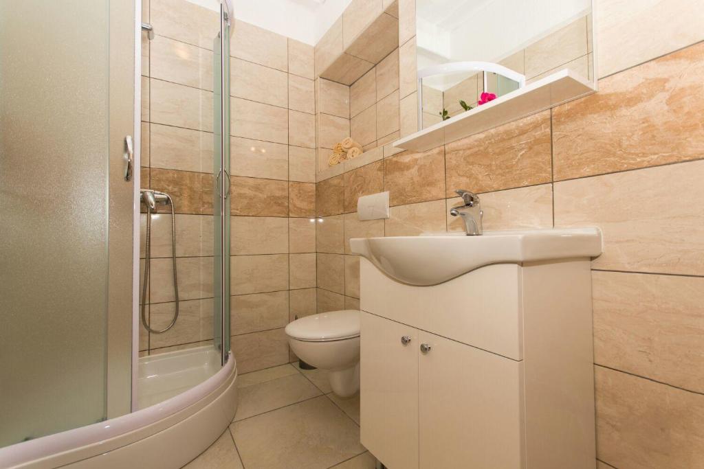 Koupelna v ubytování Apartment Bareta