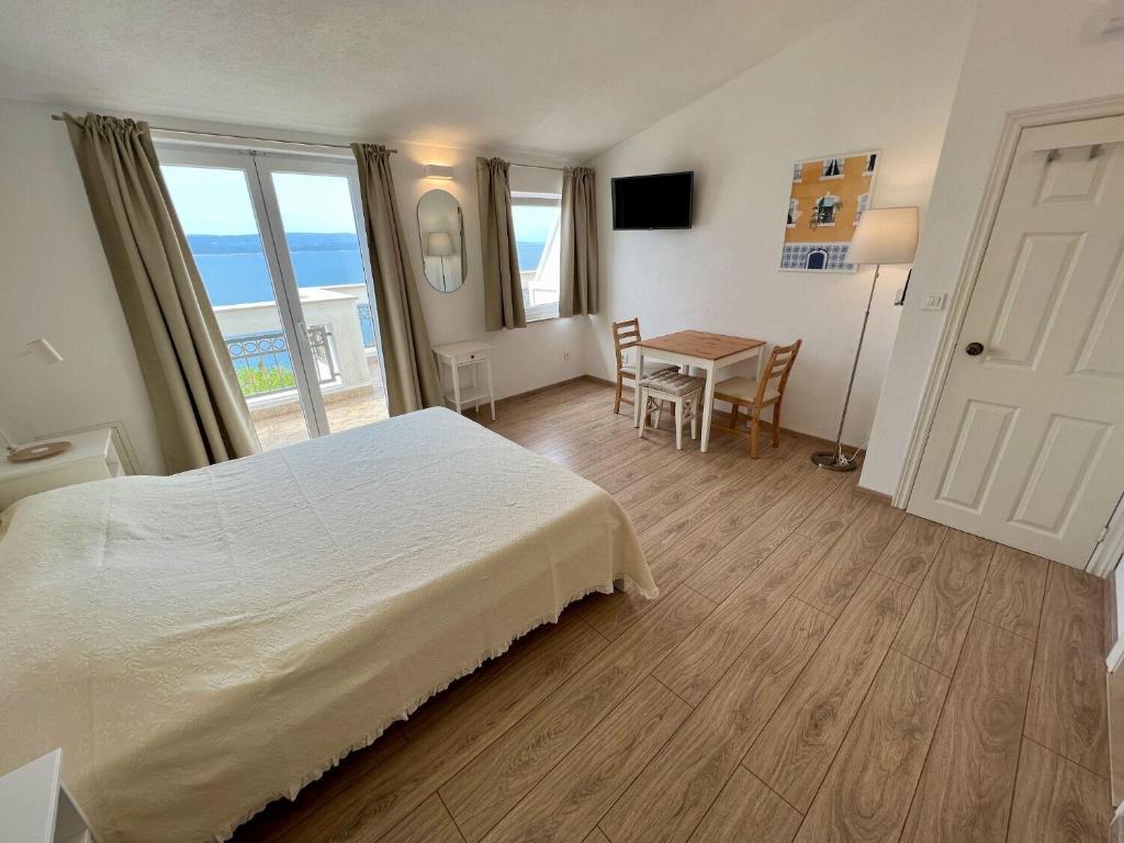 Posteľ alebo postele v izbe v ubytovaní Apartment Via
