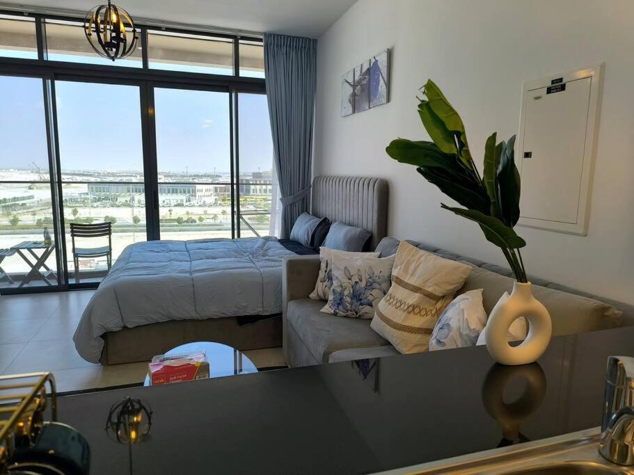 Postel nebo postele na pokoji v ubytování Venus saadiyat beach apartment with SeaView