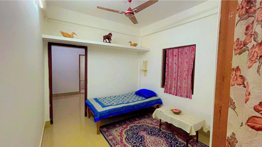 Ένα ή περισσότερα κρεβάτια σε δωμάτιο στο Kunkunpaati