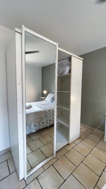 Postel nebo postele na pokoji v ubytování Le Cerisier côtelé