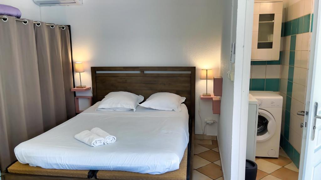 Postel nebo postele na pokoji v ubytování Le Cerisier côtelé