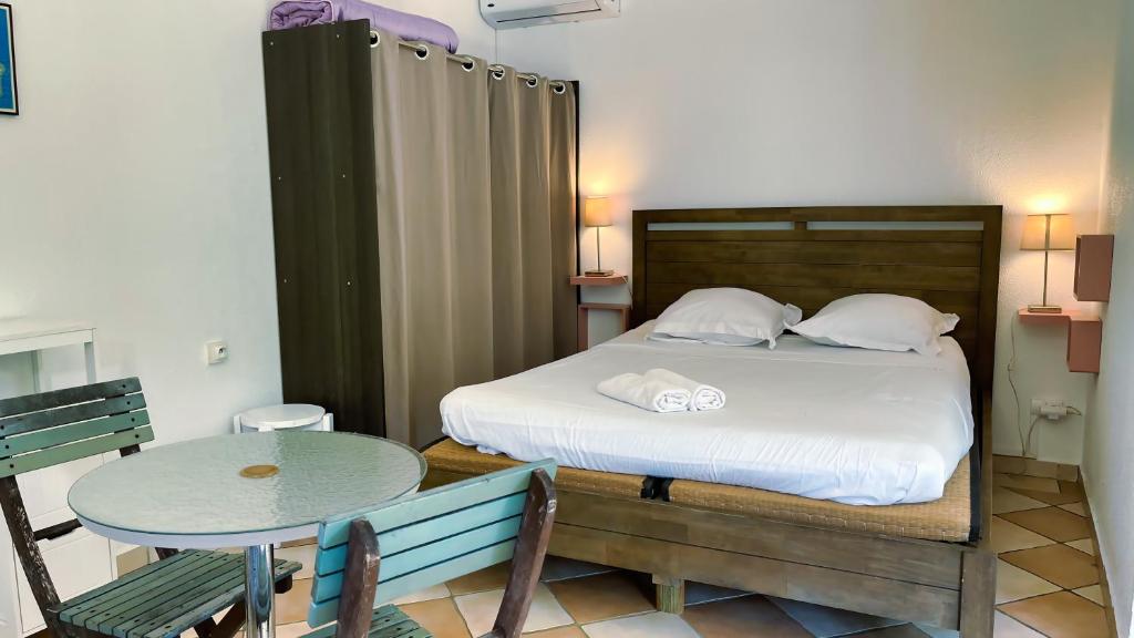 Postel nebo postele na pokoji v ubytování Le Cerisier côtelé