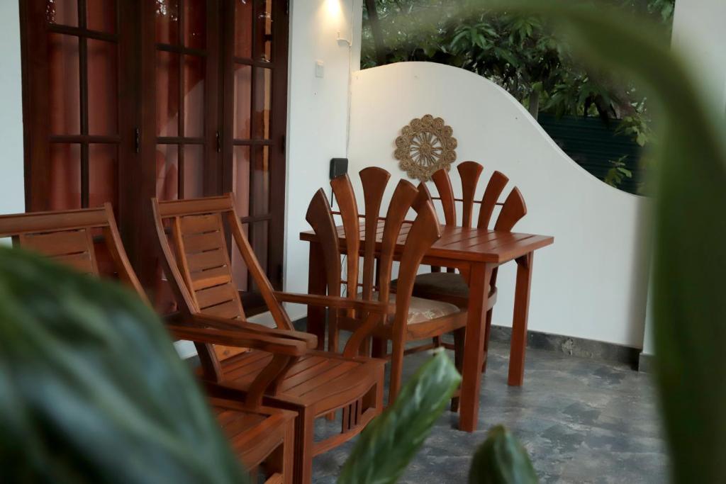 Posezení v ubytování The Cattleya Guest House Sigiriya