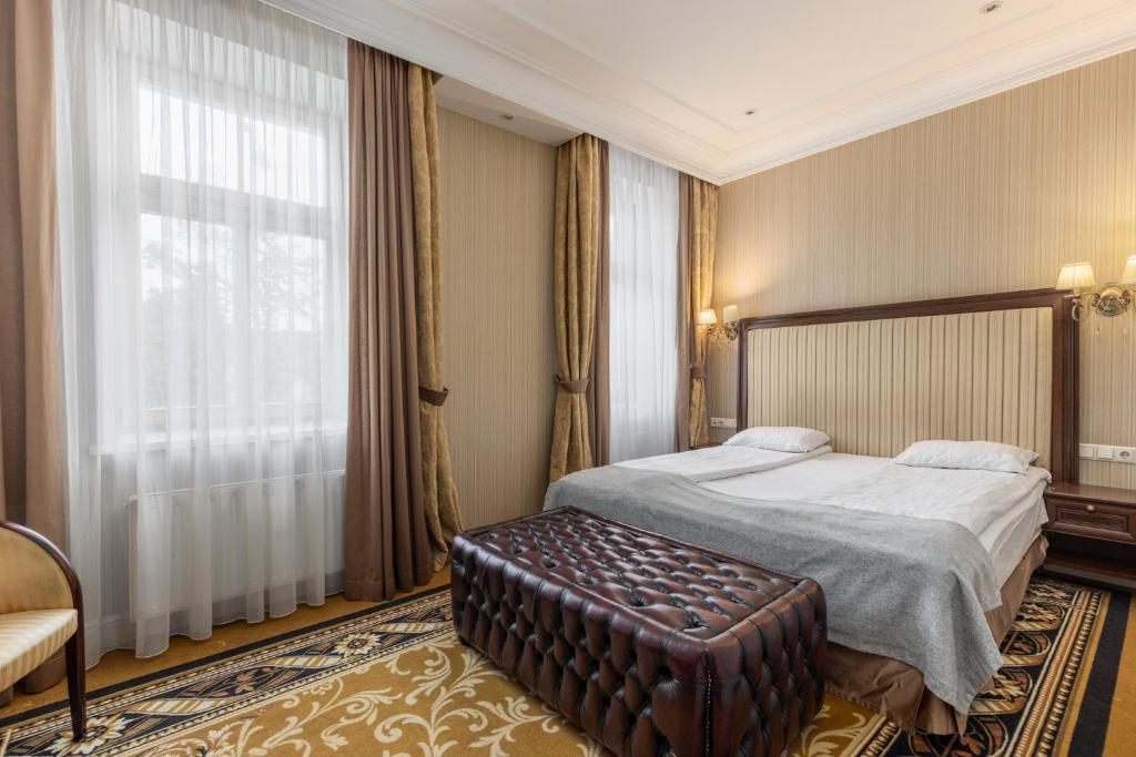 Gulta vai gultas numurā naktsmītnē Gertrude Hotel self check-in