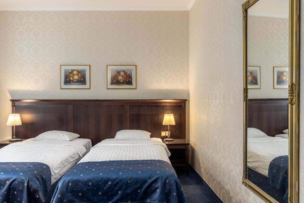 Gulta vai gultas numurā naktsmītnē Gertrude Hotel self check-in