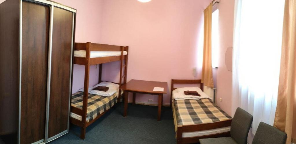 Postel nebo postele na pokoji v ubytování Mini-Hotel Ocean